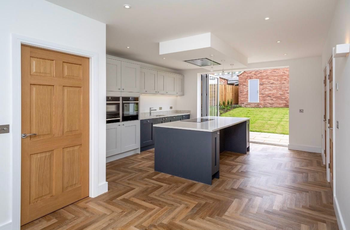 Completed kitchen extension with island and garden access